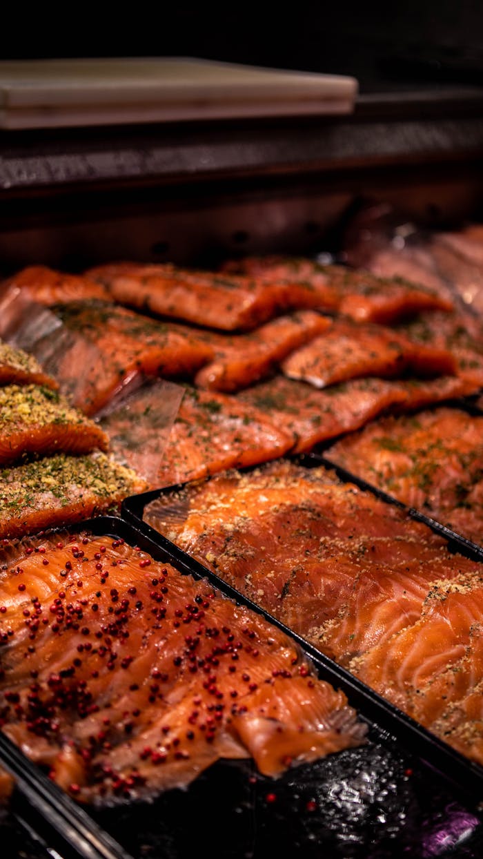 freshly-prepared-herb-seasoned-salmon-fillets-33852617